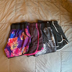 Bundle of 4 Champion and Hanes XL running shorts
